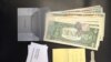 Wallets like these, with cash, a key, a grocery list and business cards, were used to determine honesty. 
