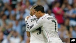 Ronaldo et Benzema lors d'un match contre le FC Barça, le 25 octobre 2014.