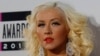 Musician Christina Aguilera arrives at the 41st American Music Awards in Los Angeles, California, Nov. 24, 2013.