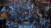 FILE - Demonstrators march for Scottish Independence through Glasgow City center, Scotland, Britain, Jan.11, 2020.