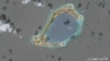 A satellite image shows what CSIS Asia Maritime Transparency Initiative says appears to be anti-aircraft guns and what are likely to be close-in weapons systems (CIWS) on the artificial island Subi Reef in the South China Sea in this image released on Dec. 13, 2016.