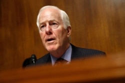 FILE - Senate Majority Whip Sen. John Cornyn, R-Texas, Chair of the Senate Judiciary Border Security and Immigration Subcommittee, speaks during a hearing about the border, May 8, 2019, on Capitol Hill in Washington.