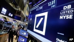 Suasana di Bursa Saham New York (26/9). (AP/Richard Drew)