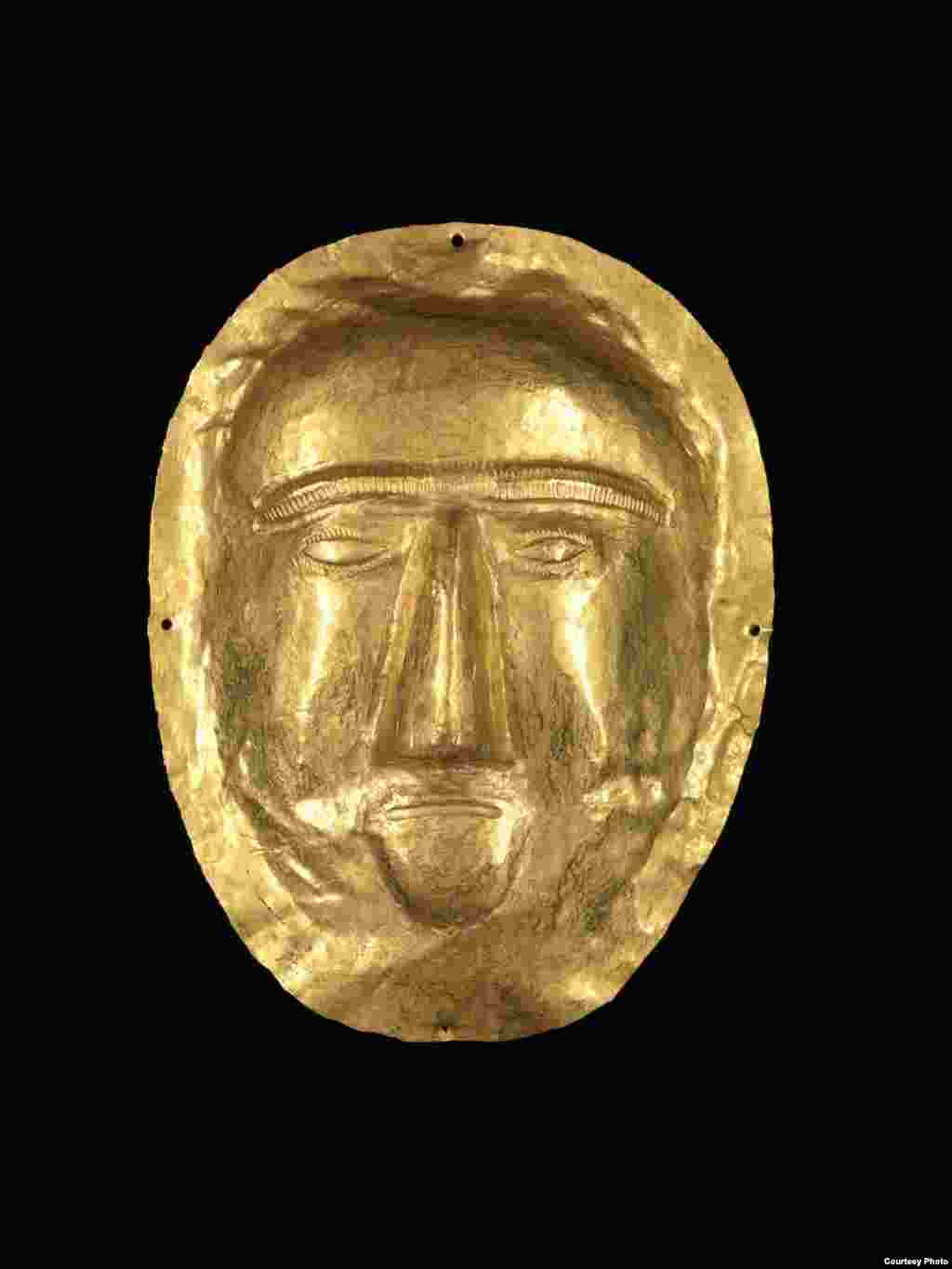 Discovered in a magnificent royal tomb in 1998, this funerary mask from the First Century CE, belonged to a young girl, whose body was covered with gold, rubies, and pearls. (Freer Sackler Galleries/Smithsonian Museum)