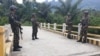  Personel Brimob dalam operasi Tinombala di Poso, Sulawesi Tengah, 4 Maret 2019. (Foto: VOA/Yoanes Litha)