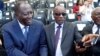 Le président guinéen Alpha Condé (à dr.) avec son homologue ivoirien Alassane Ouattara lors d'une cérémonie marquant le 75e anniversaire du débarquement allié en Provence pendant la Seconde Guerre mondiale, à Saint-Raphaël, en France, le 15 août 2019.