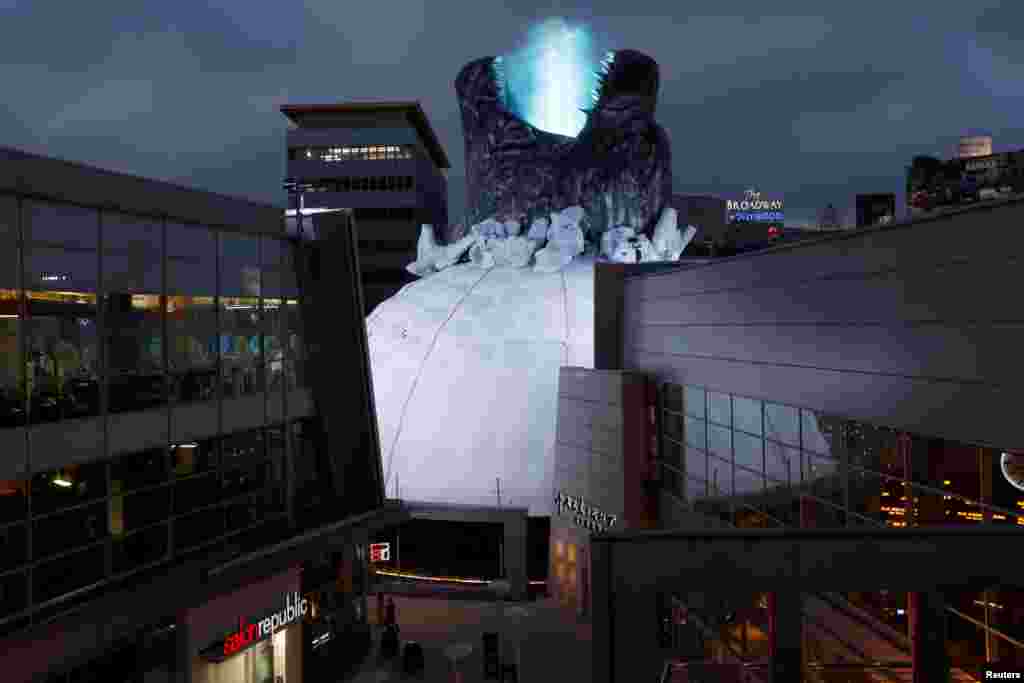 A prop promoting the film "Godzilla: King of the Monsters" is pictured on the roof of the Cinerama Dome theatre in Los Angeles, California, June 3, 2019.
