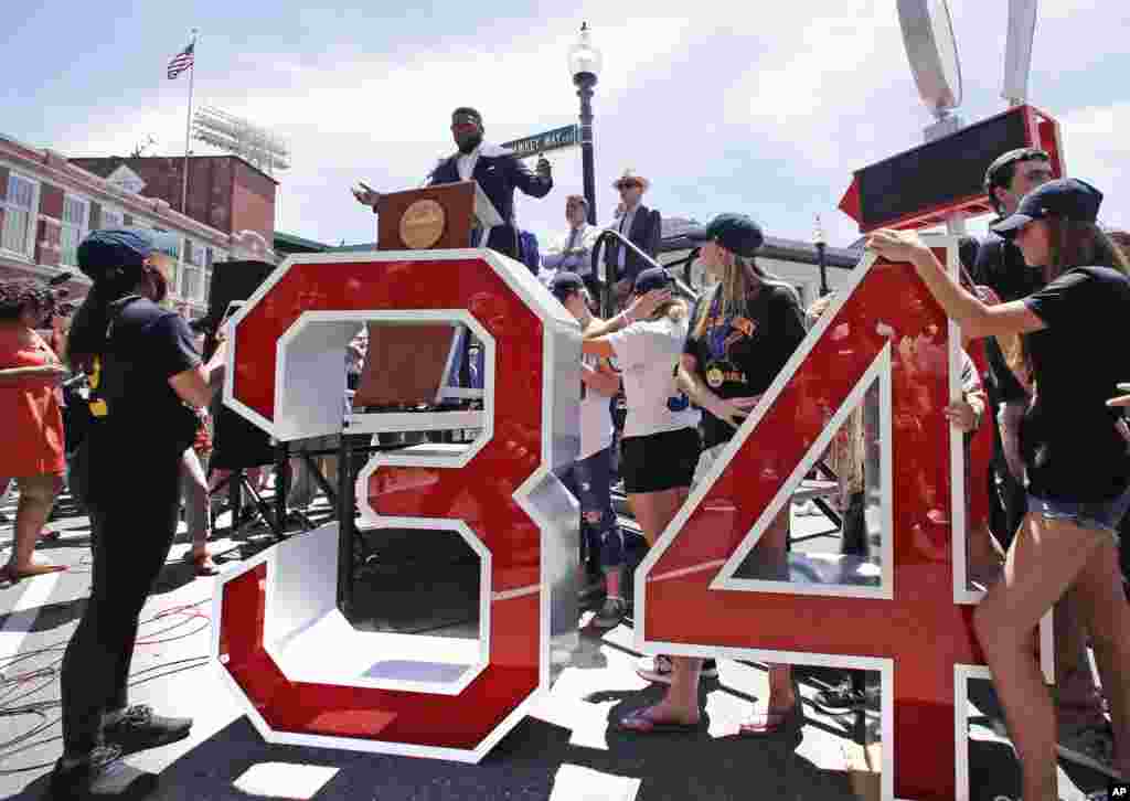 Retired Boston Red Sox designated hitter David Ortiz addresses a gathering, where part of Yawkey Way was renamed David Ortiz Drive.