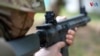 Ukrainian civilians attend training centers learning to fight