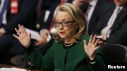 Sakatariyar harkokin wajen Amurka Hillary Clinton a lokacin da take ganawa da 'yan majalisar wakilan Amurka domin fadin abinda ta sani dangane da harin Benghazi