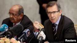 Bernardino Leon, right, the U.N. special envoy for a Libya, addresses Libyan political leaders and rivals in Algiers Tuesday. At left is Algeria's Minister of African and Maghreb Affairs, Abdelkader Messahel, March 10, 2015. 