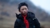 8歲的雲南「冰花男孩」王福滿(2018年1月11日)。 雲南山區魯甸的8歲小學生王福滿身穿單薄的衣服攀爬山路走到學校，頭髮上結滿了白白冰花的照片，讓無數網友心碎和震驚。