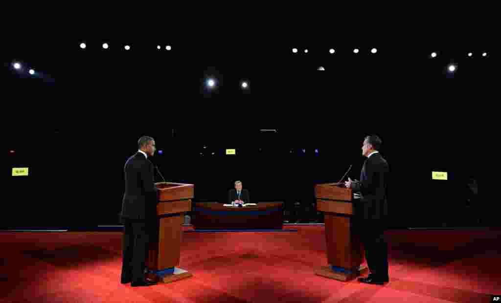 President Barack Obama and Republican presidential nominee Mitt Romney participate in the first presidential debate at the University of Denver in Denver.