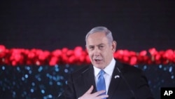 Le Premier ministre israélien Benjamin Netanyahu prononce un discours lors de l'inauguration d'un monument en l'honneur des vétérans et des victimes du siège de Leningrad à Jérusalem, le jeudi 23 janvier 2020. (Marc Israel Sellem/Pool Photo via AP)
