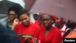 Activists pressure Nigeria's government to find schoolgirls abducted in April. The Bring Back Our Girls initiative sponsored a rally in Lagos July 5, 2014. 