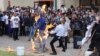 Cambodian-Australians burn effigies of Hun Sen's photos in Australia. (Courtesy of SK Media Inc. Facebook page)