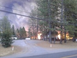 The Camp Fire surrounded Magalia Community Church, but four men kept the flames at bay by throwing dirt on the fire, and even beating a tree caught on fire with bare hands. (Jan Gee/Courtesy Photo)