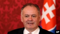FILE - Slovak President Andrej Kiska addresses the media after talks with Austrian President Alexander van der Bellen at the Hofburg palace in Vienna, Austria, Monday, Feb. 19, 2018.