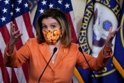 Speaker of the House Nancy Pelosi, D-Calif., meets with reporters at the Capitol in Washington, Oct. 8, 2020.