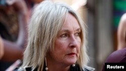 June Steenkamp, mother of Reeva Steenkamp, arrives at the North Gauteng High Court in Pretoria for the second day of sentencing procedures for Oscar Pistorius, October 14, 2014. 