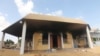 FILE - An exterior view shows the U.S. consulate in Benghazi, Libya, a day after it was attacked and set on fire September 11, 2012.
