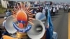 The logo of opposition Cambodia National Rescue Party (CNRP) is displayed before a rally on the first day of the country's commune election campaign at outside Phnom Penh, Cambodia, Saturday, May 20, 2017. (AP Photo/Heng Sinith)