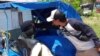 Seekor penyu sisik yang ditangkap nelayan dan hendak dijual ke lepau tuak di Tapanuli Tengah, Sumatera Utara, Minggu, 1 September 2019. (Courtesy: Komunitas Menjaga Pantai Barat)