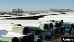 FILE - A depot used to store pipes for TransCanada Corp.'s planned Keystone XL oil pipeline is seen in Gascoyne, North Dakota, Nov. 14, 2014. 