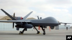 FILE - A U.S. MQ-9 drone is seen at Kandahar Airfield, Afghanistan, Jan. 23, 2018. 