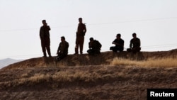 Pasukan Peshmerga Kurdi tampak dekat Altun Kupri, antara Kirkuk dan Erbil, Irak, 20 Oktober 2017. 