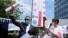 Medics March to WHO Headquarters in Climate Campaign