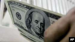 Países como Venezuela pudieran enfrentar una peor situación en 2015 también a causa de la caída de los precios del petróleo