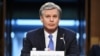 FBI Director Christopher Wray testifies before the Senate Judiciary Committee on Capitol Hill in Washington, March 2, 2021. Wray is condemning the Jan. 6 riot at the Capitol as “domestic terrorism.”