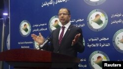 Le président du Parlement irakien, Salim al-Jabouri, s'exprime lors d'une conférence de presse au siège du Parlement, à Bagdad, le 14 avril 2016.