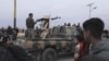 Syrian Kurdish gunmen control the area around Qamishli's airport in northeastern Syria on Dec. 8, 2024, following the fall of the capital Damascus to anti-government fighters.