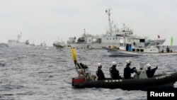 日中兩國船艦因為島嶼爭端而經常出現對峙狀態(資料圖片)