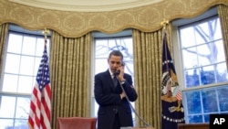 President Barack Obama discusses the START treaty, during a phone call with Russia's President Dmitry Medvedev, 26 Mar 2010