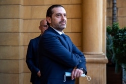 FILE - Then-outgoing Prime Minister Saad Hariri waits to welcome Egyptian Foreign Minister Sameh Shukry before their meeting at his house in downtown Beirut, Lebanon, April 7, 2021. (AP Photo/Hassan Ammar)