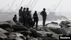 Membres d’une unité des forces spéciales vénézueliennes intervenues sur un rivage à Macuto, le 3 mai 2020. Le gouvernement vénézuélien a annoncé avoir déjoué un complot de mercenaires.