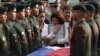 Relatives grieve for a soldier killed while fighting Abu Sayyaf militants in the southern Philippines. Services were at Villamor Air Base near Manila June 21, 2014.