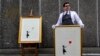 Dua versi dari karya ikonik seniman asal Inggris Banksy yang diberi nama "Girl with Balloon," ditampilkan dalam sebuah acara di Southbank, London, pada 30 Agustus 2019. (Foto: AP/Kirsty Wigglesworth)