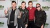 FILE - Eli Maiman, from left, Nicholas Petricca, Kevin Ray and Sean Waugaman of the band Walk the Moon pose for photographers.