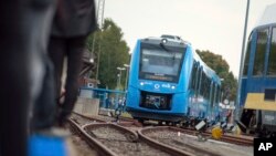 A fuel cell train, which is powered by hydrogen, arrives in Bremervoerde, northern Germany, Sept. 16, 2018.