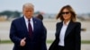 FILE PHOTO - U.S. President Donald Trump walks with first lady Melania Trump at Cleveland Hopkins International Airport in Cleveland