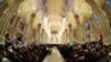 Parishioners wait patiently for the Pope to arrive at St. Patrick's Cathedral in Manhattan, New York, Sept. 24, 2015.