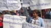 Workers held banners at a rally on International Labor Day on May 1, 2018, in Phnom Penh, Cambodia, calling for an end of discrimination toward labor unions and to support a minimum wage for all sectors. (Hul Reaksmey/VOA Khmer)