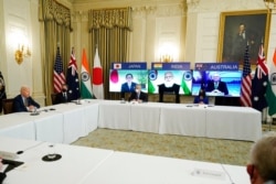 FILE - President Joe Biden speaks during a virtual meeting with Indian Prime Minister Narendra Modi, Australian Prime Minister Scott Morrison and Japanese Prime Minister Yoshihide Suga, from the White House, March 12, 2021, in Washington.