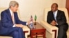 AU Deputy Chairperson Erastus Mwencha and U.S. Secretary of State John Kerry