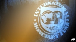 El Fondo Monetario Internacional dice que Argentina y Brasil mejorarán sus economías gradualmente.