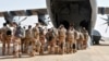FILE - The last French soldiers board a French military plane to leave Niger for good, at the French base which was handed over to the Nigerien army, in Niamey, Niger, on Dec. 22, 2023.